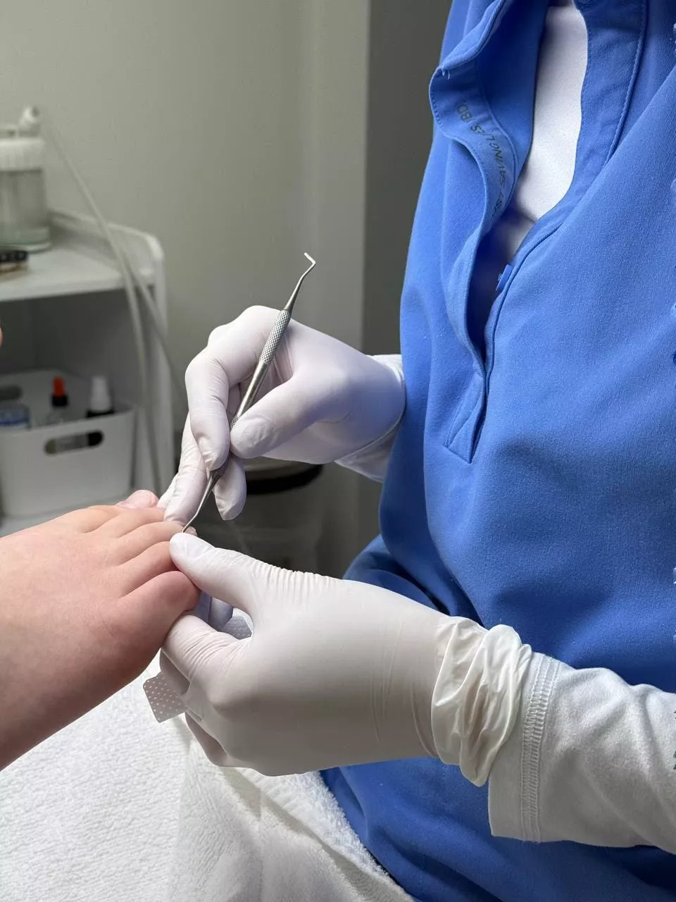 Foot care specialist performing a waterless wellness pedicure in Rockville MD